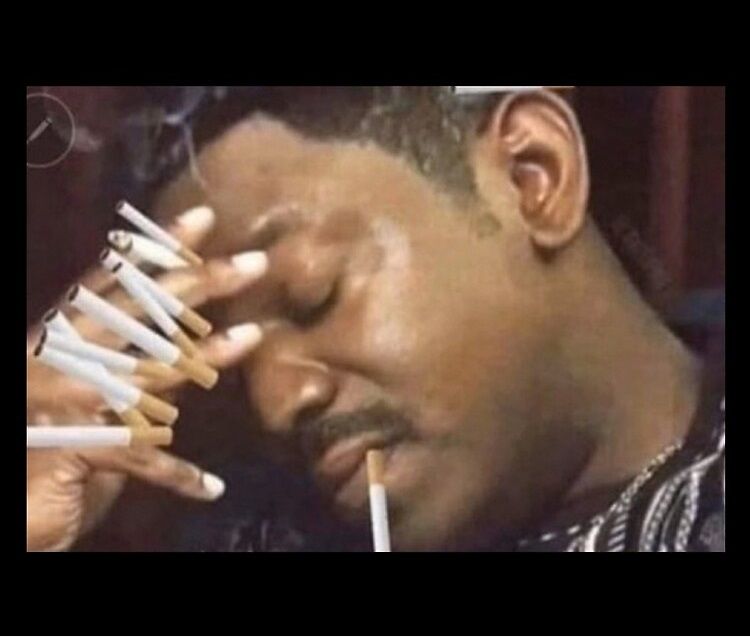a famous meme where you see a man's face who look tired with a lot of cigarets in his hand. 
