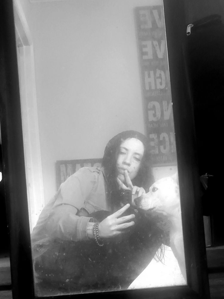 A selfie of Kira the Hippo and a ghost of Eli 