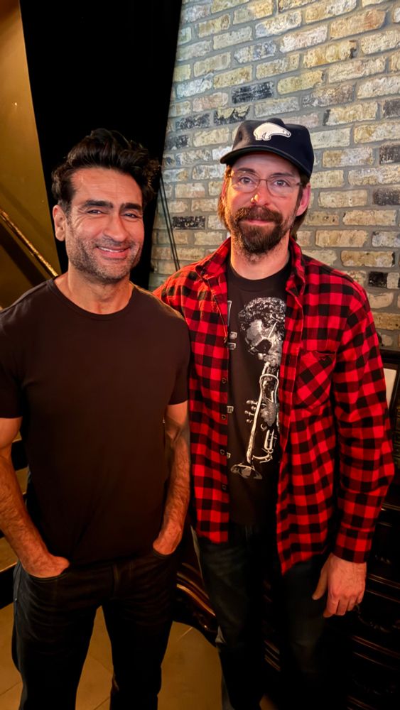 Kumail Nanjiani with Martin Starr. Both look happy because they both are happy. 