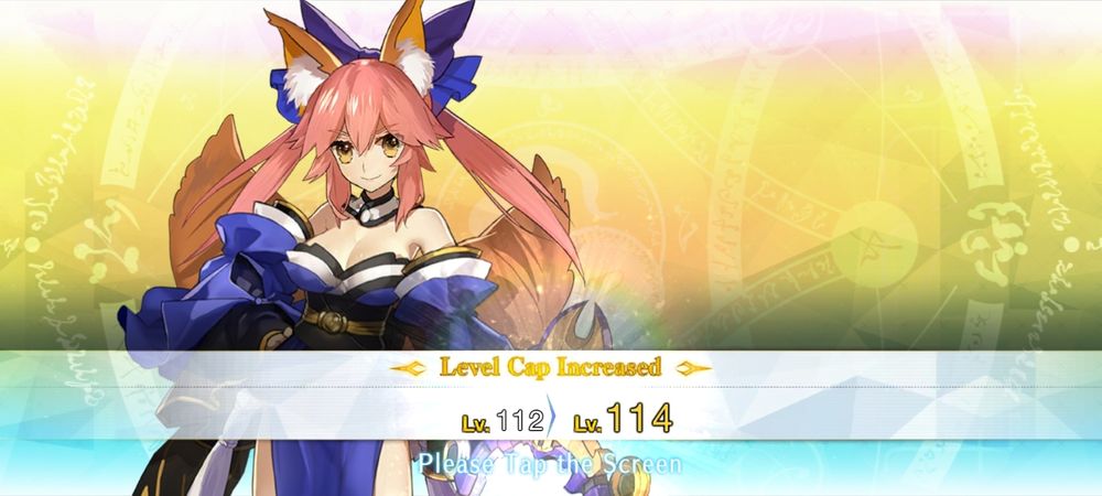 The level cap increase screen for Tamamo No Mae, over a gold and blue background Tamamo is a orangy pink haired fox girl wearing a revealing blue psudo shrine maiden outfit which shows off her breasts and shoulders. The bottom half of the screen is showing a message that her level cap went from a maximum level of 112 to 114