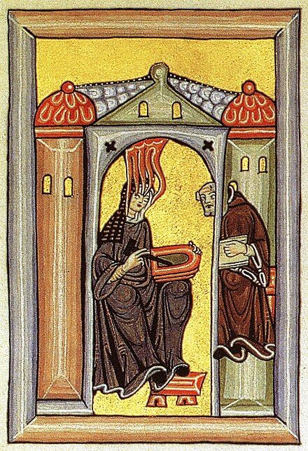 Illustration circa 1151, Hildegard of Bingen receiving divine visions, and dictating them to what is probably the first Reply Guy.