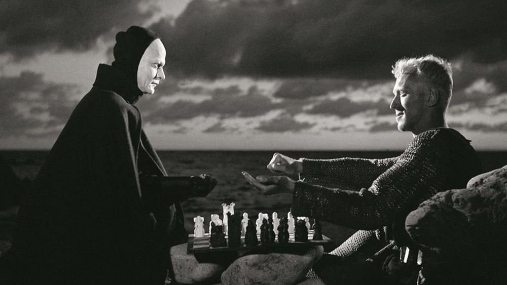 A still from The Seventh Seal. Personified Death plays chess with a road-weary knight.