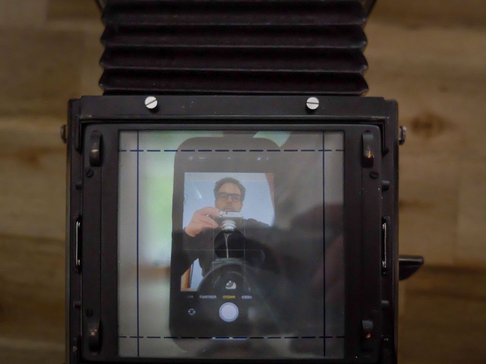 Self portrait with iphone, mamiya rb67 and fuji x30.