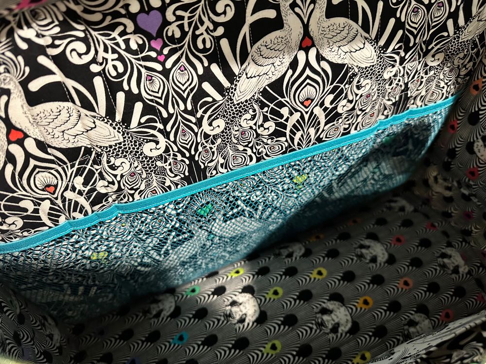 Inside divided mesh pockets. These are stretchy