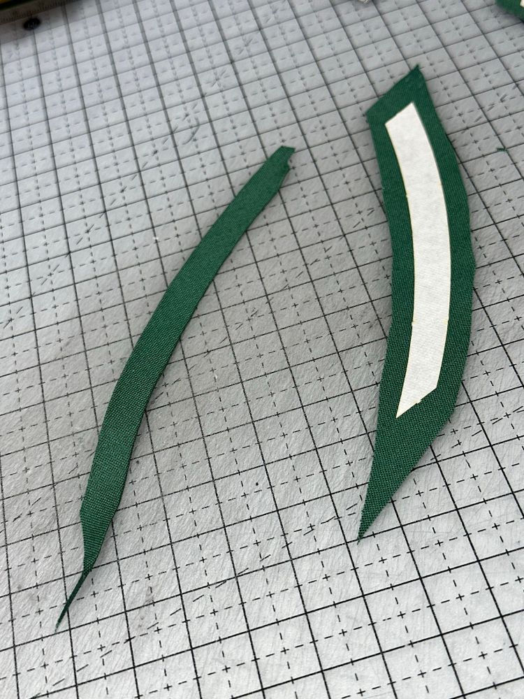Appliqué pieces for the leaf stems. They looked like green beans. 