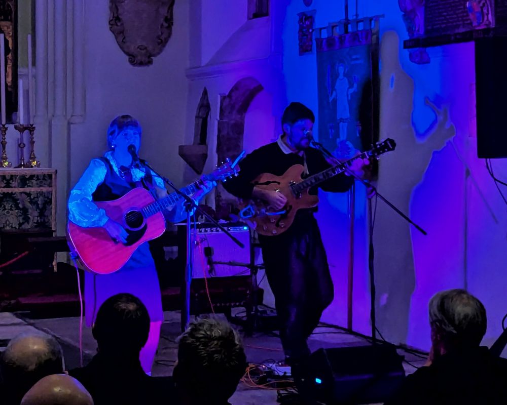 Courtney Marie Andrews and her guitarist (can't remember his name, sorry) performing on-stage at St Pancras Old Church. 