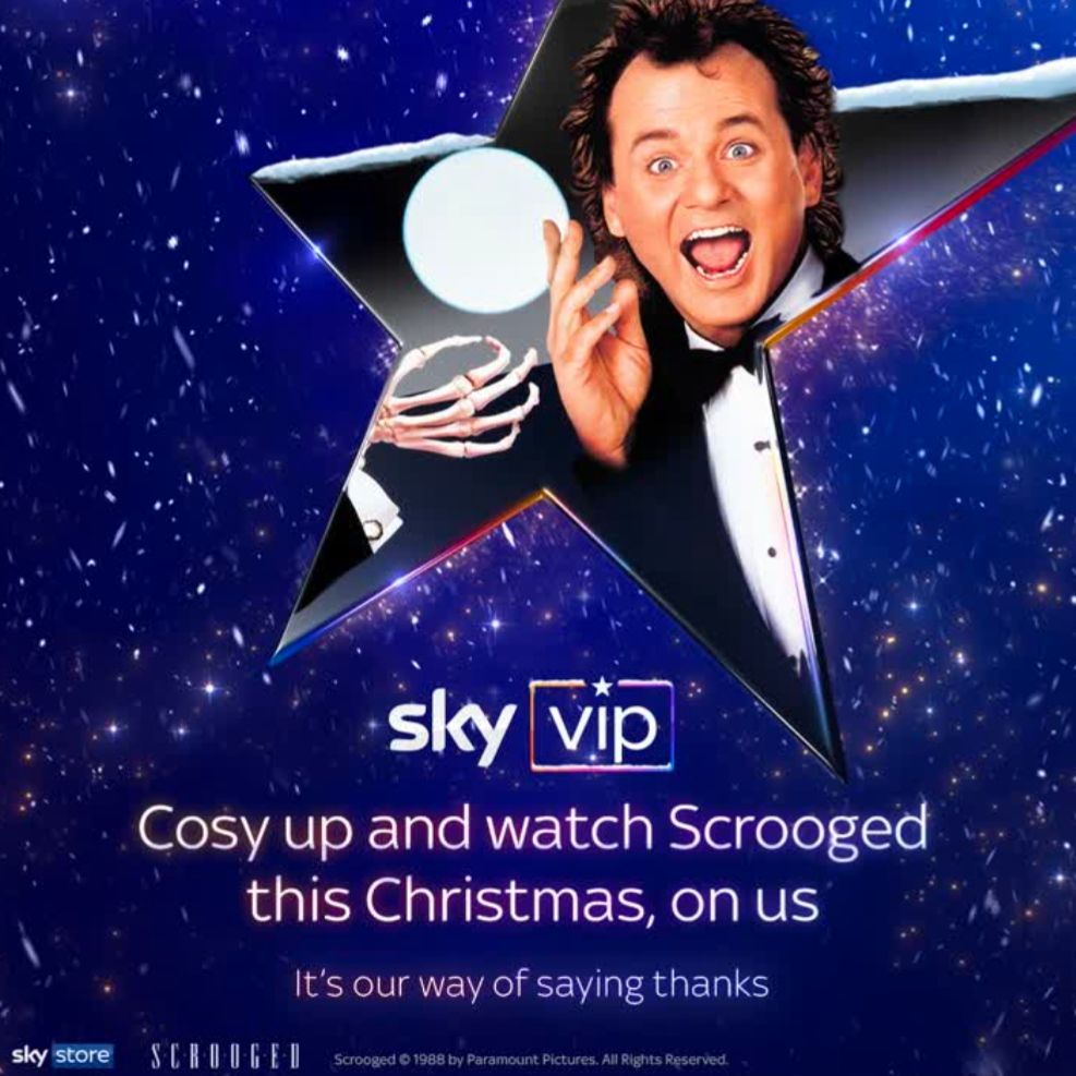 Advert for Scrooged on the Sky VIP service, featuring an original promotional image in which Bill Murray holds a cigar to his mouth, not noticing it is being lit by a match held in a ghostly, skeletal hand. But the cigar and match are now missing, so Murray is just holding his hand up in an inexplicable gesture. 