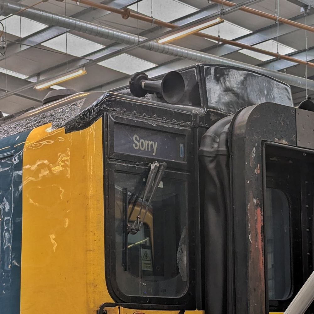 Cab window of a slightly old-fashioned electric train. Above it, the destination blind reads "Sorry".

(the one on the other side says "not in service" but it's not funny if you can see that as well)