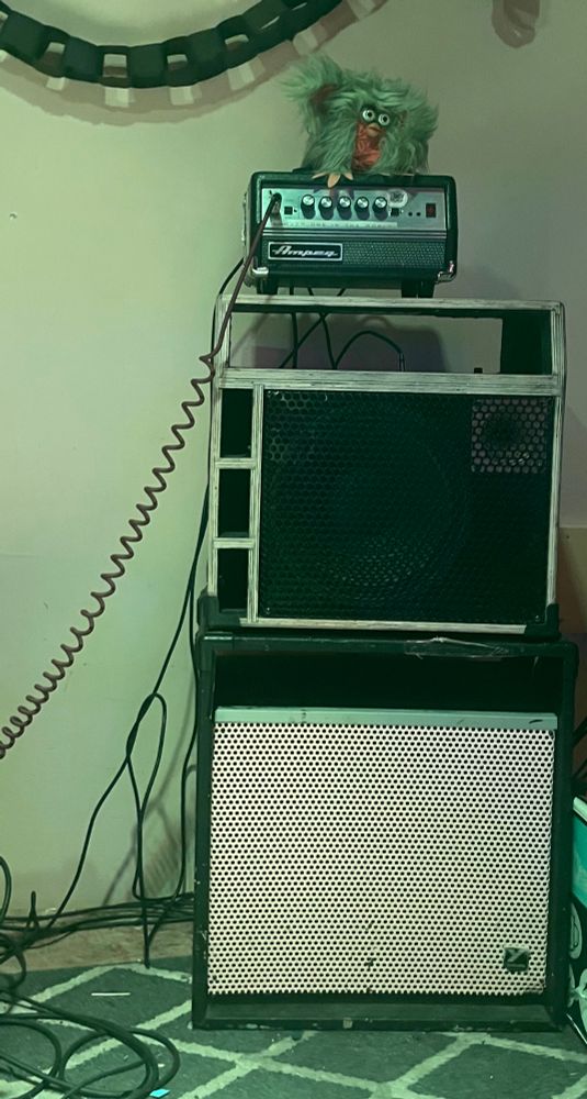 Kate’s bass amp with Saltine the furby