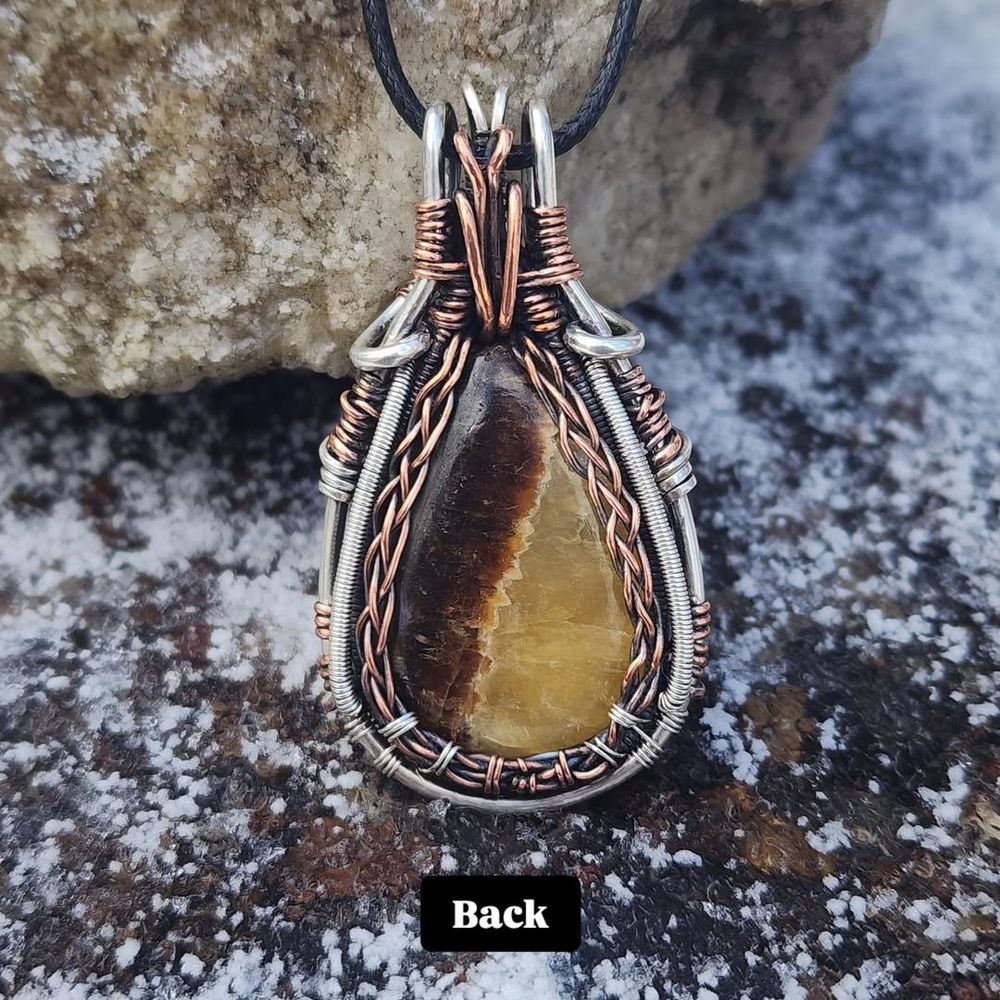 Handcrafted Septarian Aragonite pendant wire wrapped in solid Sterling Silver and Copper 
