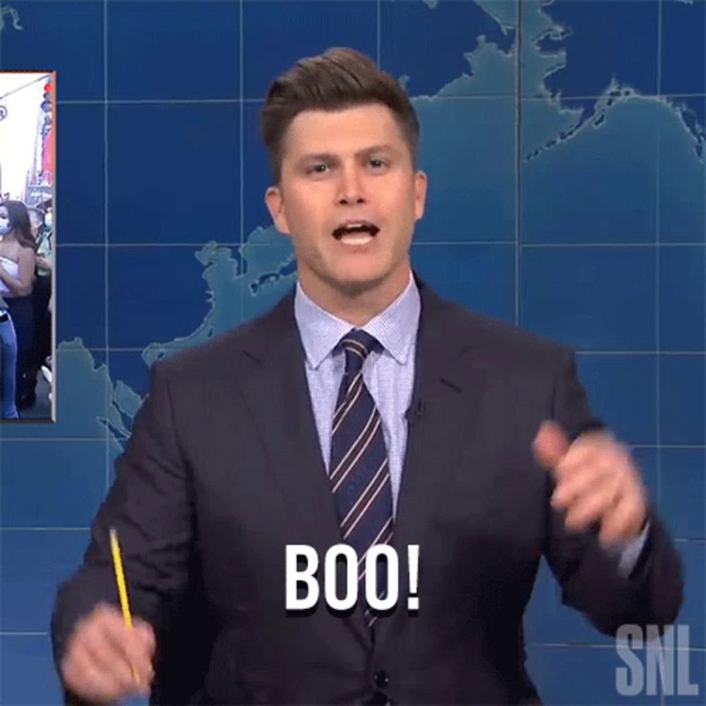 a man in a suit and tie says boo on snl