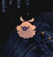 Picture of a flea from hollow knight which is like a little flying shaggy dog :3