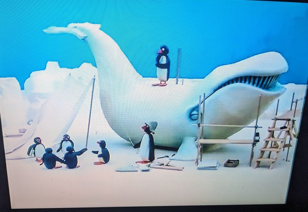 Pingu and a big ice whale.