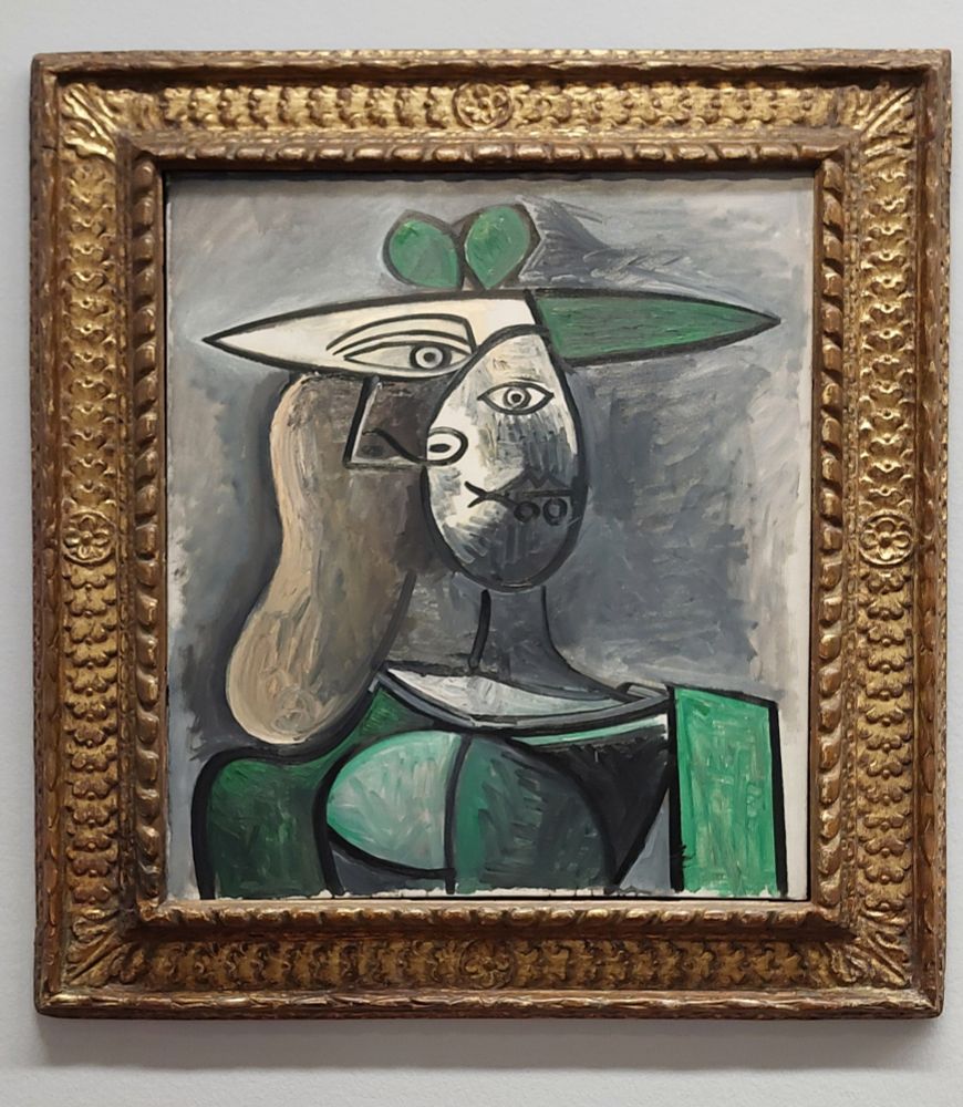 Gemälde von Picasso: Frau im grünen Kleid mit geteiltem Kopf