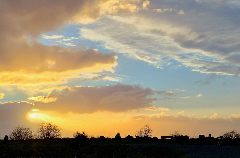Rays of sunshine bounce amongst the clouds. Glowing gold giants, galavanting above the ground. Down below, in shadows sit, the shoreline dark and poorly lit. I walk in darkness towards the light, alone on this beach, not a soul in sight. Surrounded by sunbeams and salty sea air, Mother Nature and i, we make a good pair. 
