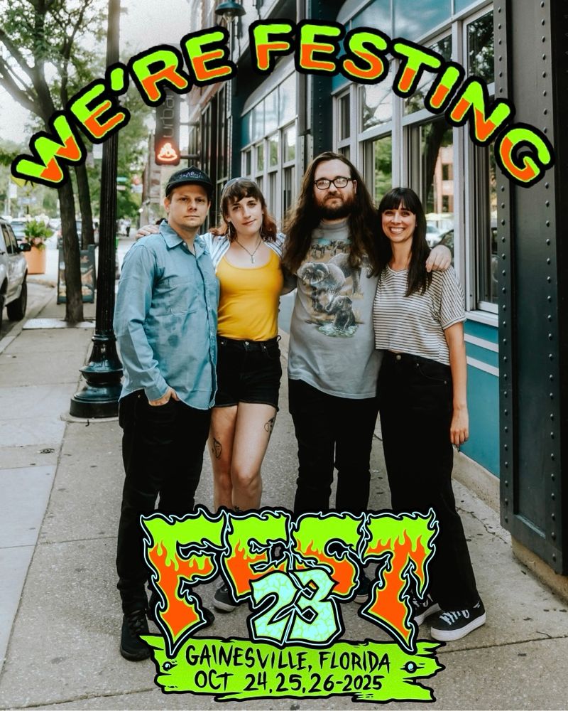 Photo of the band that says “we’re festing”