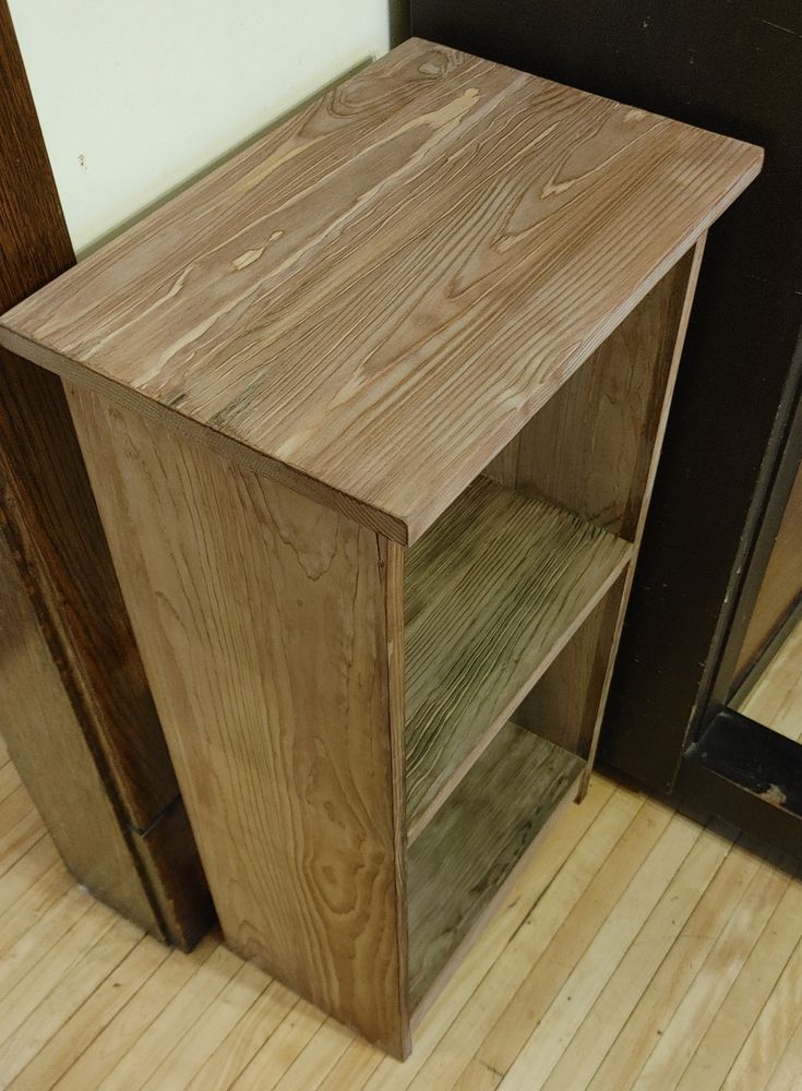 Iron acetate reacts with tannins in the wood in minutes. The top is purplish; different reactions in earlywood and latewood make the grain patterns pop.