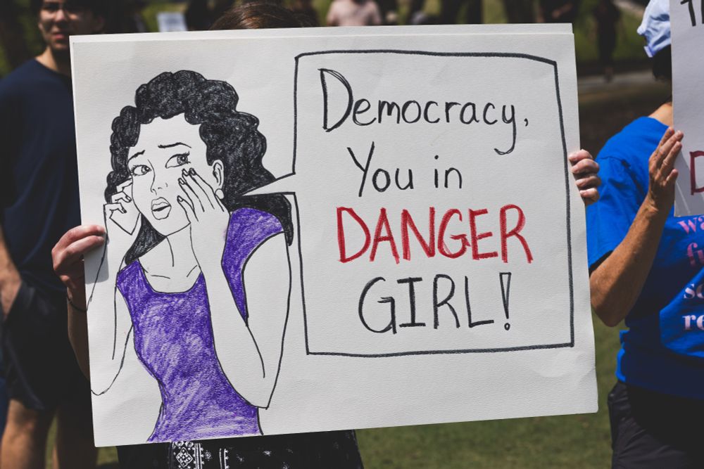democracy, you in danger girl!