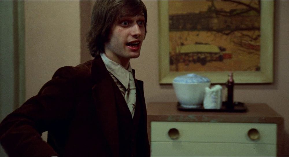 TAXI DRIVER: the gun salesman in the hotel room starts trying to sell Travis on drugs and cars, a wide-eyed wild look to him