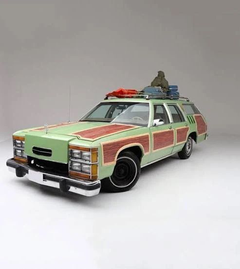 Wagon Queen Family Truckster, a heavily modified 1979 Ford LTD Country Squire station wagon in pea green and faux wood paneling from National Lampoon’s Vacation. 