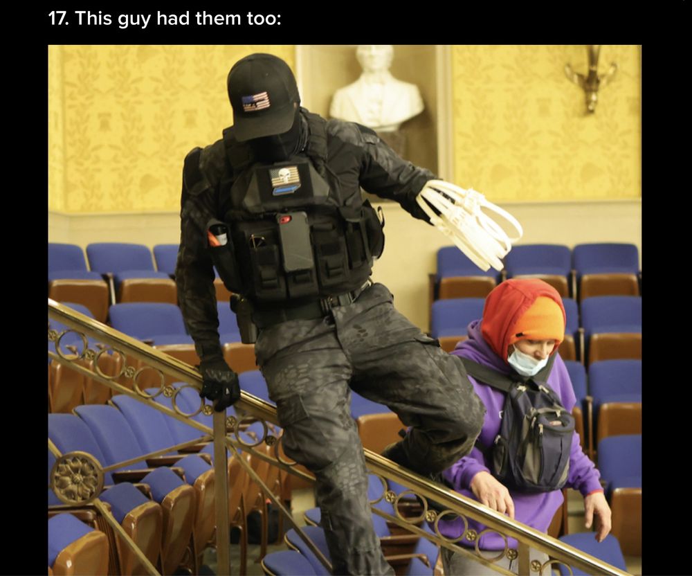 J6 insurrectionist in tactical gear on the floor of Congress. 