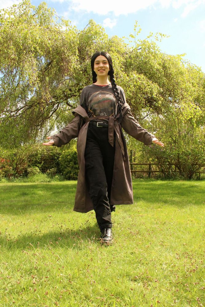 Photo of Nona from the Locked Tomb Series walking towards the camera