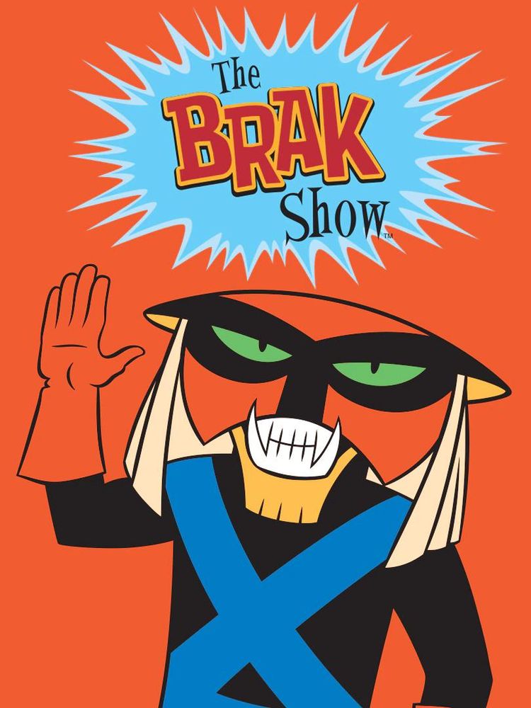 Brak. The Brak Show. A masked feline alien with a startlingly similar blond fringe around his head. He’s smiling toothily and raising one hand