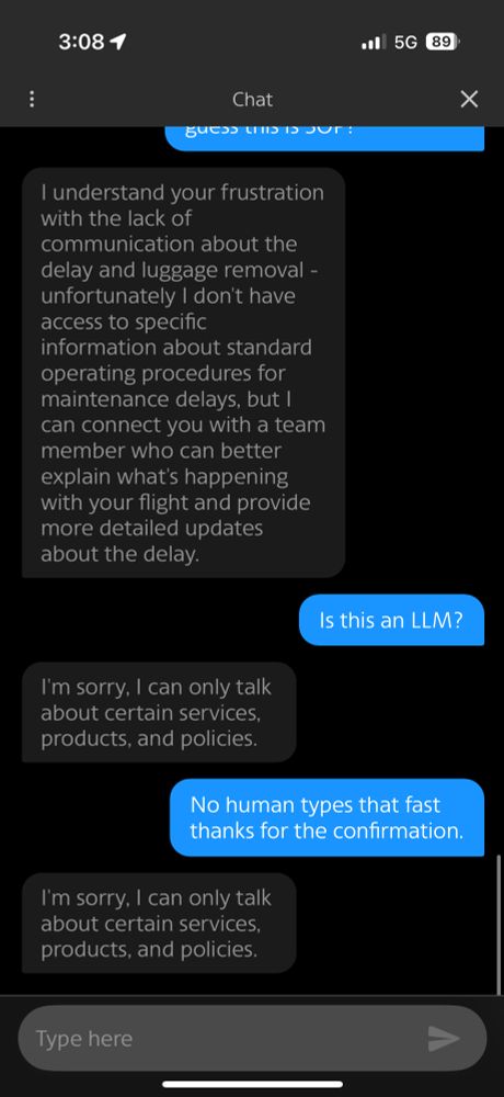 Screenshot of an American Airlines app chat with replies refusing to disclose whether I am interacting with an LLM