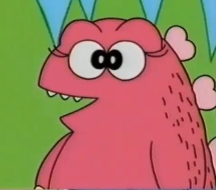 gojirin the girl godzilla from that one japan-only godzilla cartoon for little kids. she is a godzilla but pink with big eyelashes & heart shaped back scale dealies