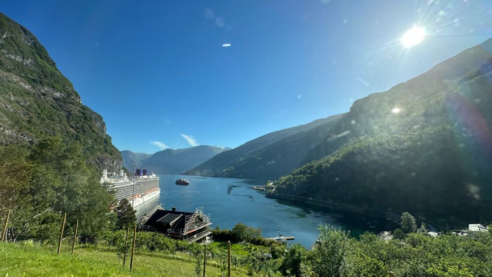 Looking out over Flåm, Aurlandsfjord, at at sunrise during the summer solstice. 