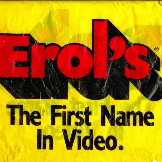 Yellow background with the word “erols” written in red with black shadow drop, and the slogan “the first name in video”