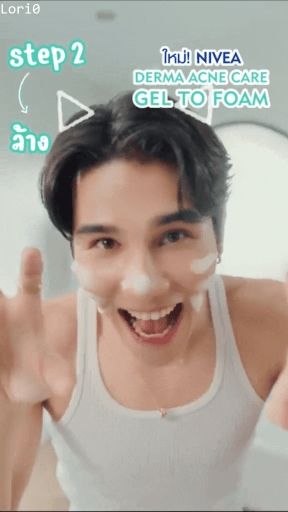 Gif of Jeff Satur with drawn cat ears and making "claw" motions with his hands 