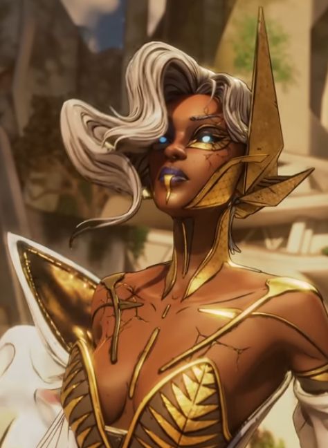 Screencap of a character from the upcoming Borderlands 4 game named Levain. A woman with warm auburn skin, cracked in places but bolsters with golden augments on her shoulders, chest, and face. She wears an oversized white shawl and has offwhite hair in a whimsical wavy style and piercing blue eyes.