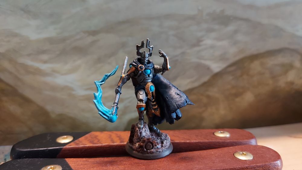 Warforged mage with a magic staff
