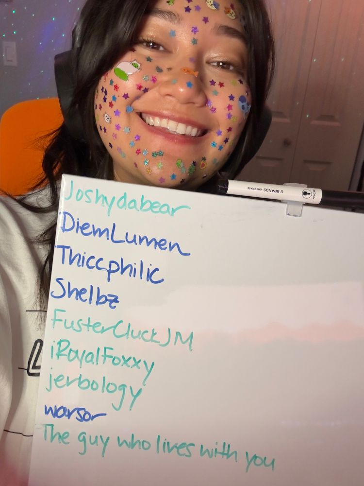 Picture of me with stickers on my face and a whiteboard listing our donators: Joshydabear, DiemLumen, Thiccphilic, Shelbz, FusterCluckJM, iRoyalFoxxy, jerbolovy, warsor, and The guy who lives with you