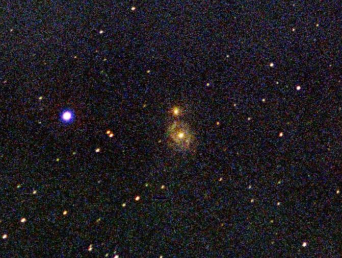 1 hour exposure of the Whirlpool Galaxy M51 with an Orion ST-80 and Amber T800 film