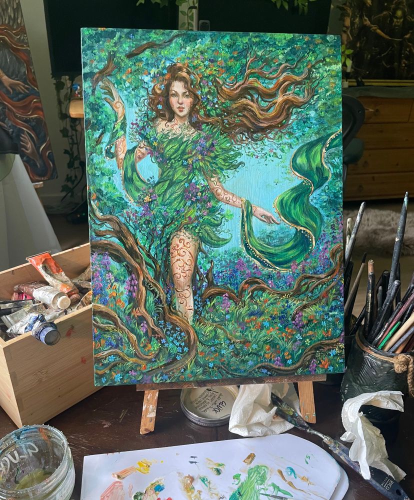 A dreamy painting of a woman that is partly plants :)