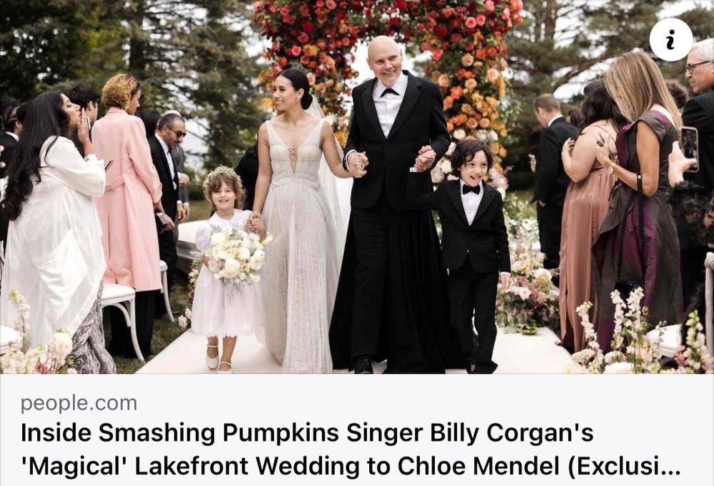 A photo of Smashing Pumpkins singer Billy Corgan looking like Nosferatu and walking a woman who appears to be his daughter down the aisle at a wedding. Nope, he’s the groom.
