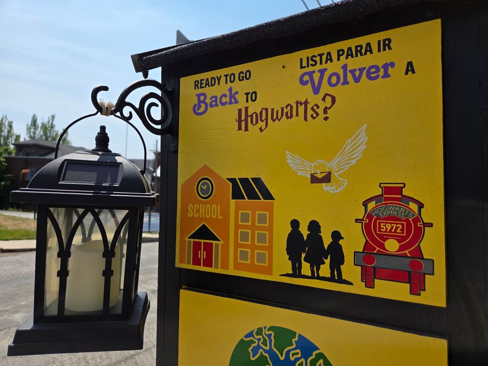 The side panel of our library with the Back To Hogwarts theme painted on.