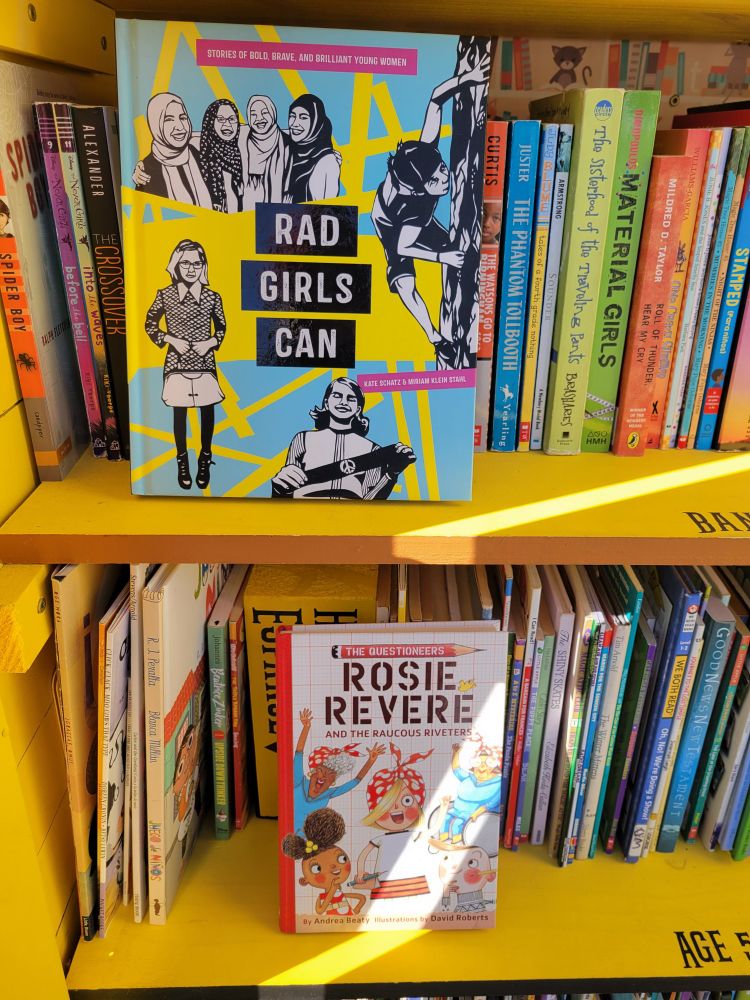 Two books placed in our library celebrating Women's History month. One book's title is: Rad Girls Can. The second title is: Rosie Revere.