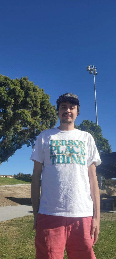 Different angle with the Person, Place or Thing shirt and me and my shorts.