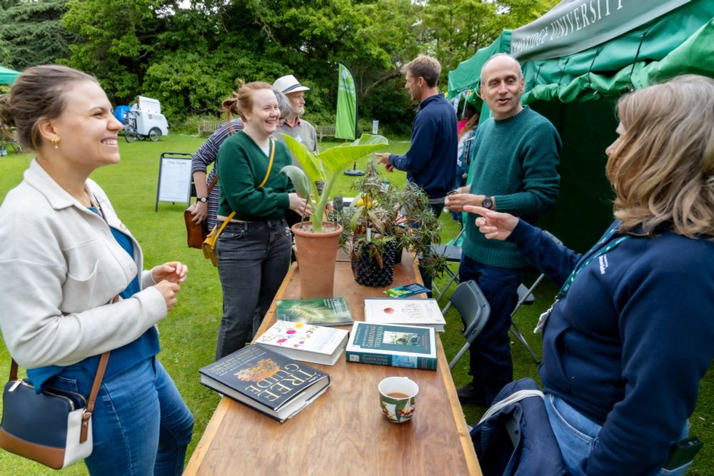 Members of the Cambridge University Botanic Garden Horticulture Team answering questions from members of the public at the Ask a Gardener stall at the Festival of Plants