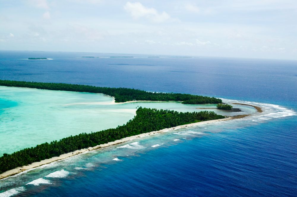 Versinkende Inseln: In hundert Jahren wird der Pazifik Inselstaaten wie Tuvalu komplett überfluten, warnen Klimaforschende – die Staaten kämpfen um ihre Existenz. Copyright:
© picture alliance / Global Warming Images | Ashley Cooper