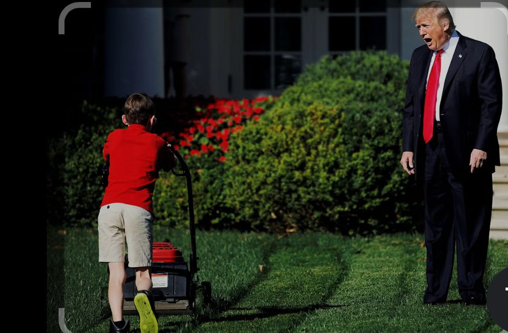 Kid mowing the White House lawn. 