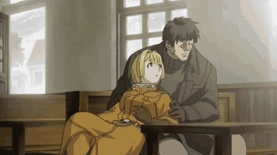 The notably small, passionate Alice and the notably big, timid Randal, sitting in a church.