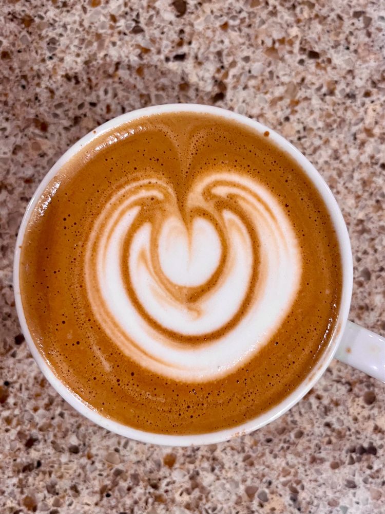 Flat white with triple wrapped heart
