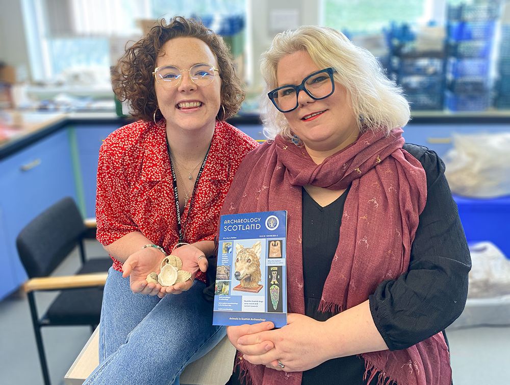 Holly Young and Kath Page with the latest issue of Archaeology Scotland.