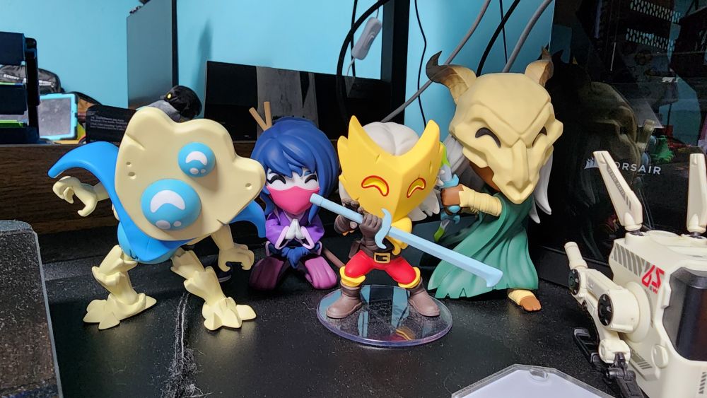My youtooz Slay the Spire collection on my desk in order from Defect, Watcher, Ironclad and Silent