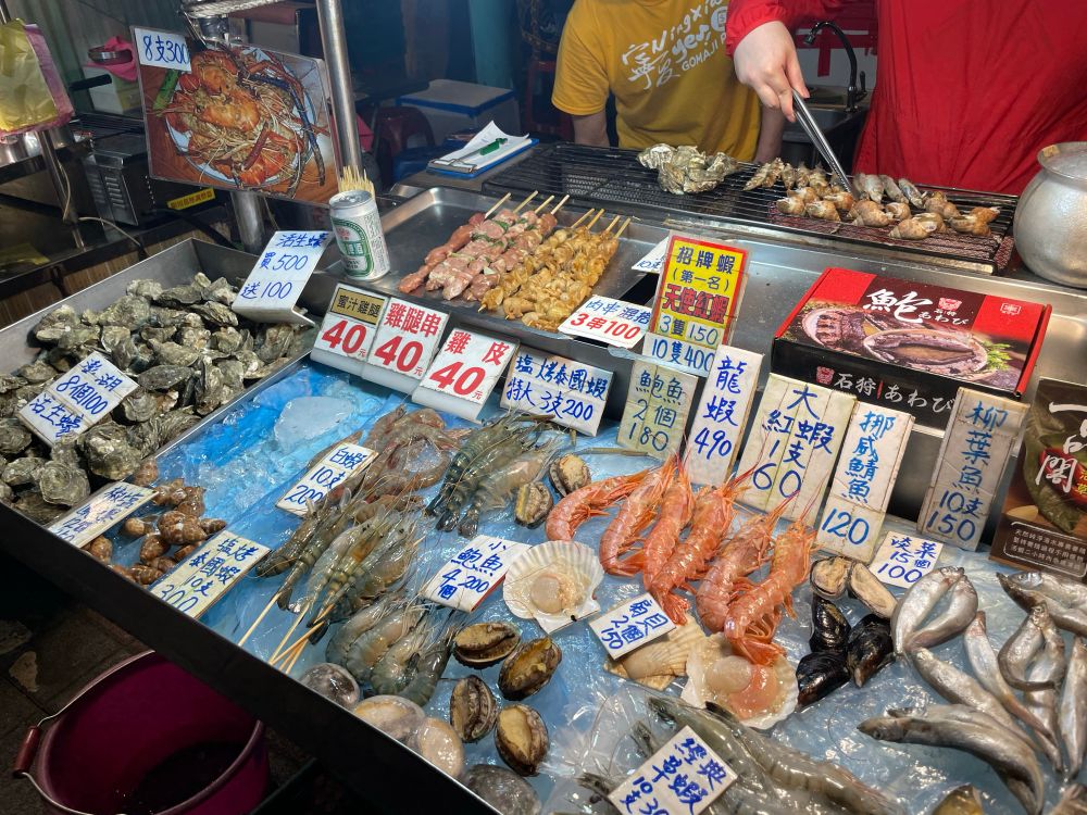 Seafood that costs 2-3 US dollars that they’ll cook for you on the fly