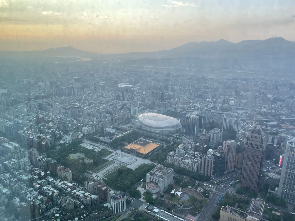 Look at this terrible skyline from Taipei 101 looking over a domed stadium. 